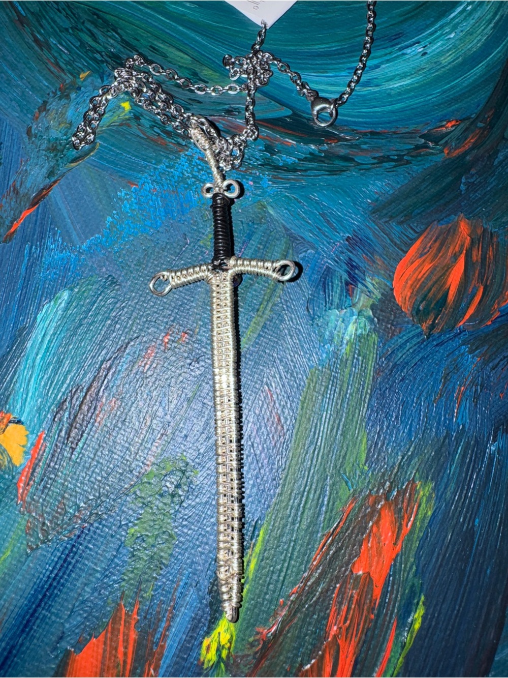Handcrafted Wire-Wrapped Sword Pendant on 20” Stainless Steel Chain.